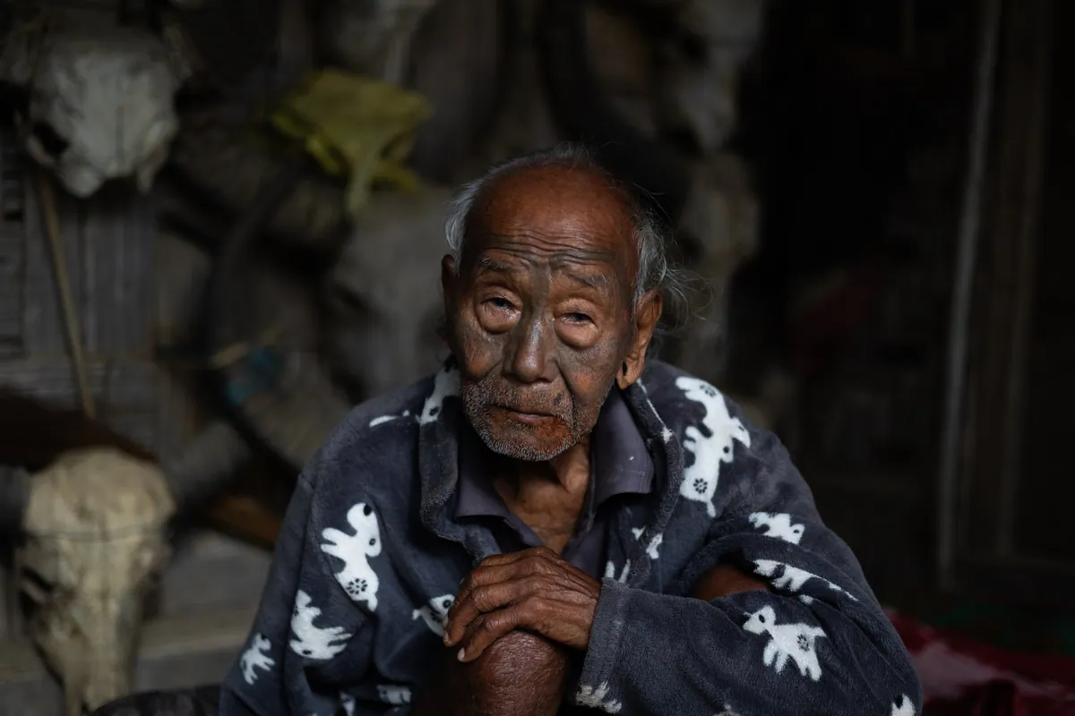 One of the few remaining ‘headhunters’ of Nagaland. His facial tattoos are a reminder of his turbulent past. Read more here. Chui Village, Nagaland (East India)